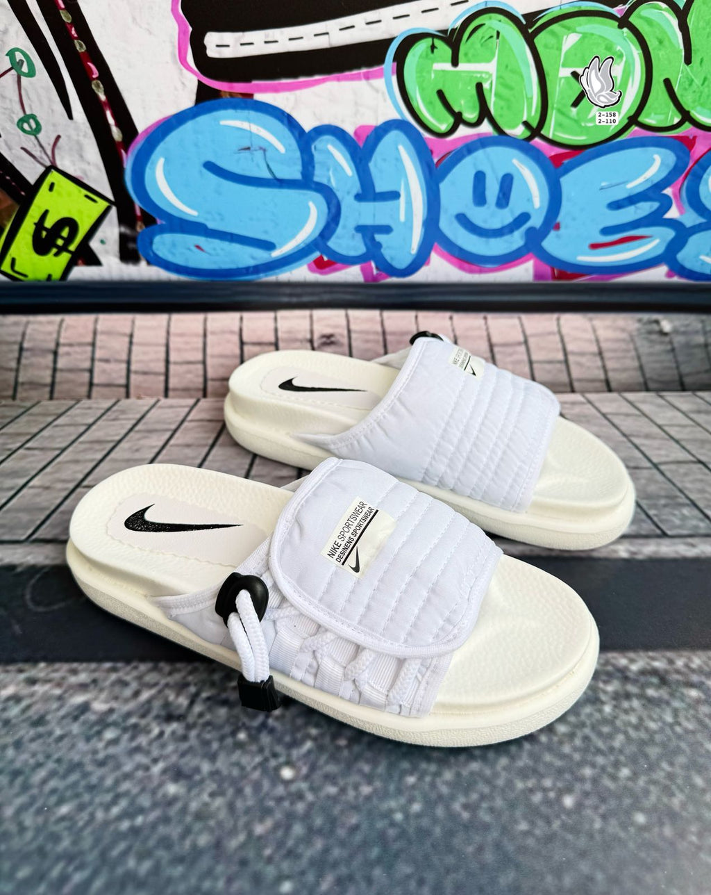 CHILA NIKE CHANCLAS